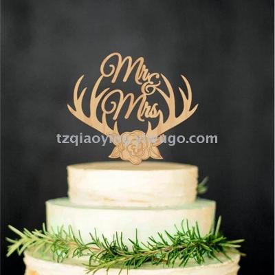 Wooden Mr Mrs Antler Christmas cake with wedding cake decoration