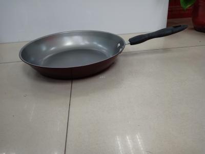 A light domestic wok for frying eggs and steak