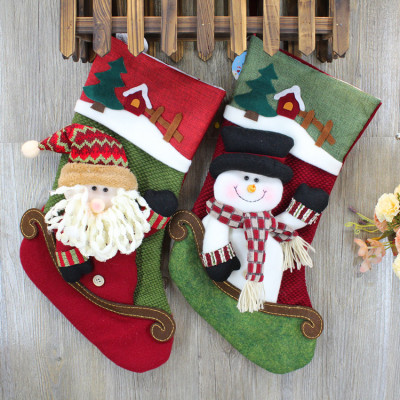 fabric christmas stocking santa and snowman decorated