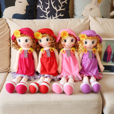 On the bed of the cute doll, put a princess doll