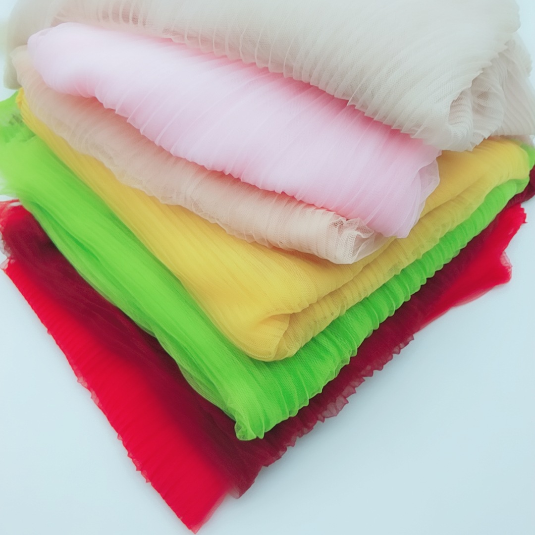 现货新款折皱涤氨弹力蕾丝面料 镂空气质蕾丝服装连衣裙用料