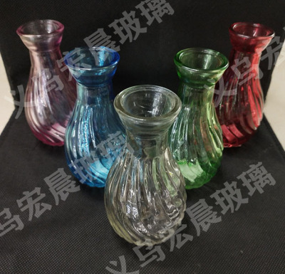 Manufacturers direct exquisite small twisted glass flower vase can spray color glass vase