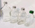 Manufacturers direct sale of delicate and small multi - capacity glass beverage bottles glass bottles