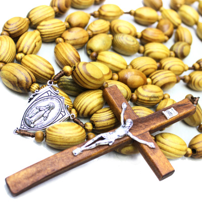 Large wooden beads hanging on walls rosary oversized religious Catholic cross church rosary wallrosary