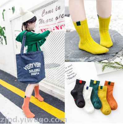 New children's socks spring and autumn boy's and girl's socks pure color imitation cloth label student socks tube socks