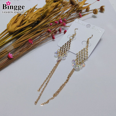 The 2019 temperament fashion female gold diamond hollowed out earrings with long tassel earrings manufacturers direct sales