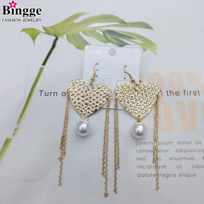 New simple joker metal heart-shaped earrings with pearl tassel web celebrity popular hot selling hot style manufacturers direct
