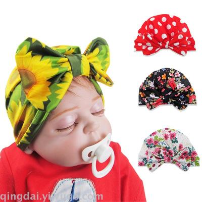 European and American children's hats children's bow-tie pullover hats printed baby's head cap newborn hats