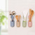 Suction cup type electric cooker rice spoon rack household kitchen plastic rice spoon holder, non - stick rice spoon rack hanging rice shovel rack