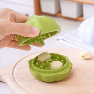 Garlic packaging and pressure Garlic kitchen quickly pressured Garlic lovely green pound Garlic Garlic device Garlic peeling device