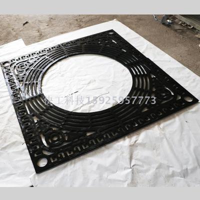 Cast iron manhole cover with strainer and tree cover
