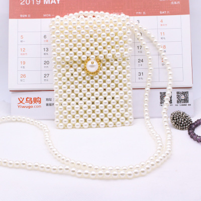 Europe and the United States fashion pearl woven bag female exquisite hand beaded cross body zero purse mini bead bag wholesale