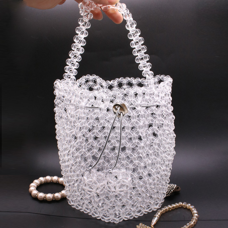 水桶珠子包日式新款亚克力透明珠手提包时尚手工编织抽绳串珠包女