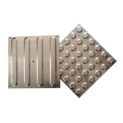 Stainless steel blind track brick