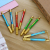 Factory Direct Sales Creative New Golden Hoop Stick Nunchaku Gel Pen Student Toys Spring Pen Double-Headed Gel Pen