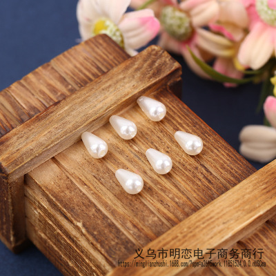Manufacturer supplies abs imitation pearl whole round perforated beads DIY handmade clothing hair accessories