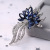 Crystal glass brooch ink blue diamond alloy brooch rose gold white K water drill brooch manufacturers direct spot supply