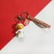 Cartoon astronaut key chain pendant fashion female bag ornaments hanging laser leather key chain doll pendant