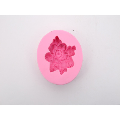 Baked rose shaped double sugar cake decorated with clay molds