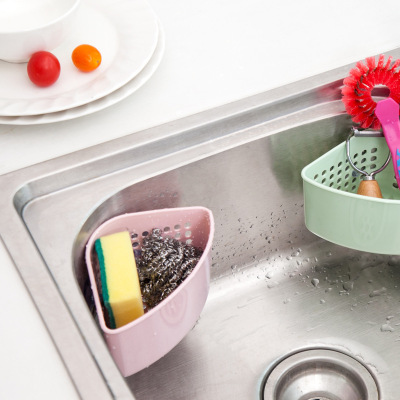 The kitchen storage is a basket asphalt water sucker sponge shelf