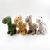 Creative round Neck Dragon Plush Key Chain Pendant Prize Claw Doll Small Dinosaur Plush Toy Gift Wholesale