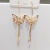 The new S925 silver pin butterfly tassel earrings are made of copper plated gold and set with 4A zircon