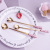 Japanese innovative rose flower scoop candy-colored ceramic handle coffee mixer scoop ice cream spoon manufacturers direct sale