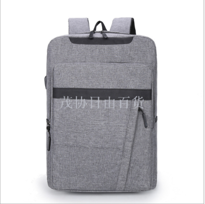 Waterproof and wear - resistant Oxford cloth USB charging business computer backpack male bag in large capacity travel bag in cross - border style