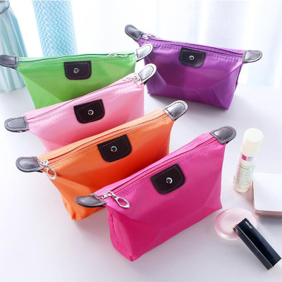 Hot style candy color dumpling bag makeup bag folding wash bag manufacturers direct LOGO gifts