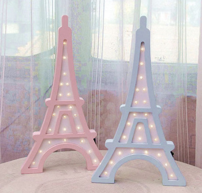 Wooden LED lights hang on the walls of the Eiffel Tower