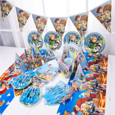 Toy story boy's birthday party with buzz lightyear-themed disposable paper plates, hats and tablecloths