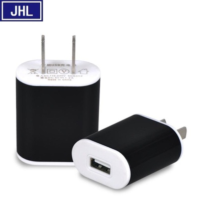 Two-color universal USB charger egg roll color two-color charging head smartphone charger European standard.