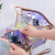 The New web celebrity laser transparent cosmetic bag \"women portable storage bag waterproof travel toiletry bag in TPU