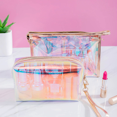 The New web celebrity laser transparent cosmetic bag \"women portable storage bag waterproof travel toiletry bag in TPU