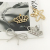 Manufacturers wholesale cross-border goods choice alloy hollow out hairpin alloy triangle moon frog clip a word clip