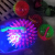 A Luminous light ball 7.5cm elastic ball a double color solid color with string and whistle to Pierce a Luminous light ball