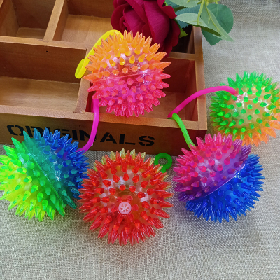 A Luminous light ball 7.5cm elastic ball a double color solid color with string and whistle to Pierce a Luminous light ball