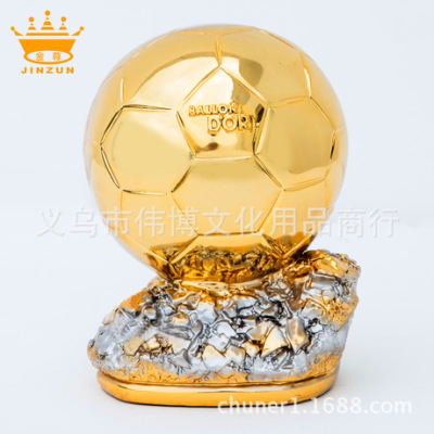 The ballon d 'or model messi two because world player of The year trophy is decorated with The football trophy
