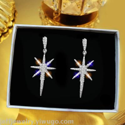 Design feeling meteor earrings 2020 new fashion temperament silver needle long eight star web celebrity light luxury earrings