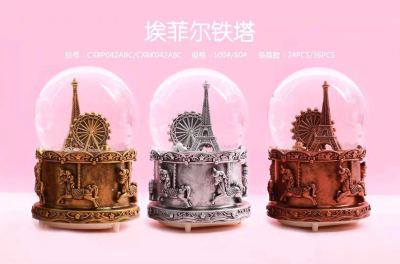 Eiffel Tower metal crystal ball music box presents children and students with a snow cartoon for their birthday