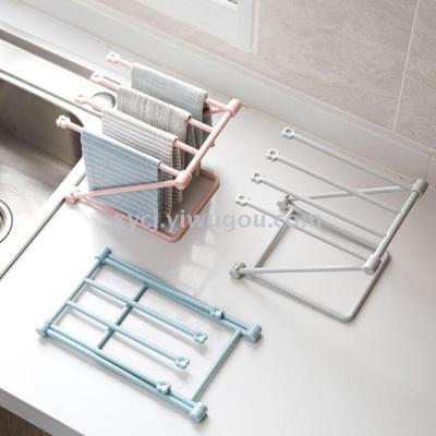 Collapsible vertical kitchen towel rack