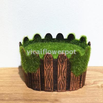 Plastic flowerpot with flocking weight and foam imitation flower pot