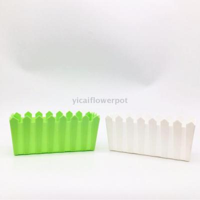 Large plastic flowerpot with solid pen