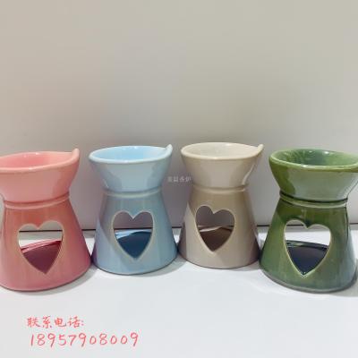 Incense burner with candle - shaped ceramic essential oil