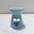 Incense burner with candle - shaped ceramic essential oil