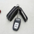 The new premium cowhide car remote control with a key package with double zipper bag