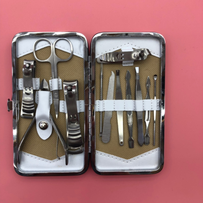 A 13 - piece stainless steel manicure and manicure kit