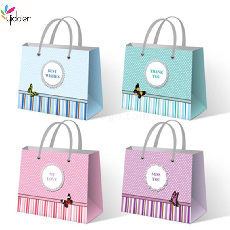 时尚蓝色底小花蝴蝶结礼品袋 商务送礼袋 礼物包装袋手提纸袋