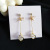 S925 silver needle sweet day earrings with long style simple bow bow cat-eye pendant set with diamond earrings for female 1065