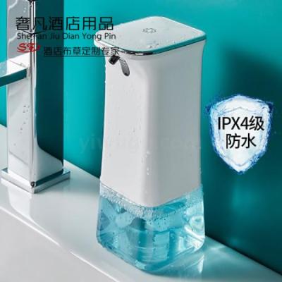 A varied wit soap Dispenser Electric induction Bubbler Foam washing Mobile phone and a clean mobile phone